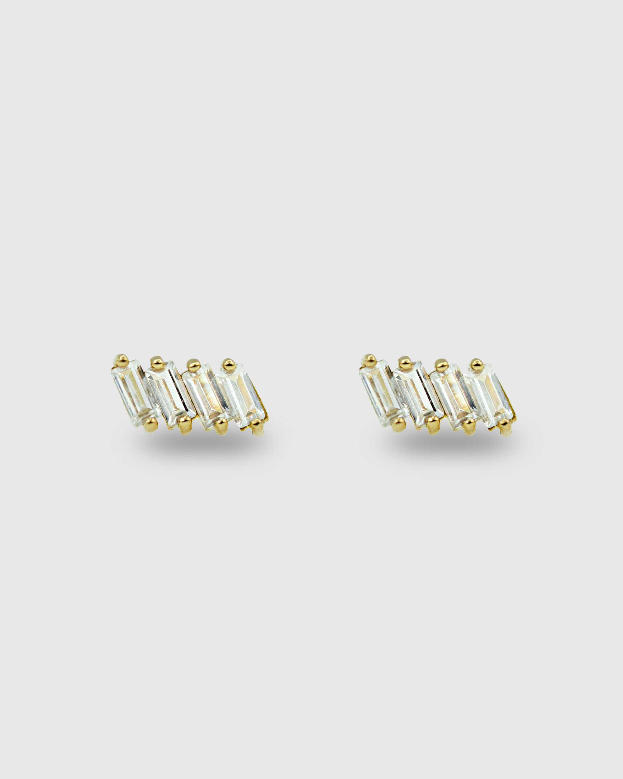 Piercing cluster de oro 14k con 4 circonitas rectangulares