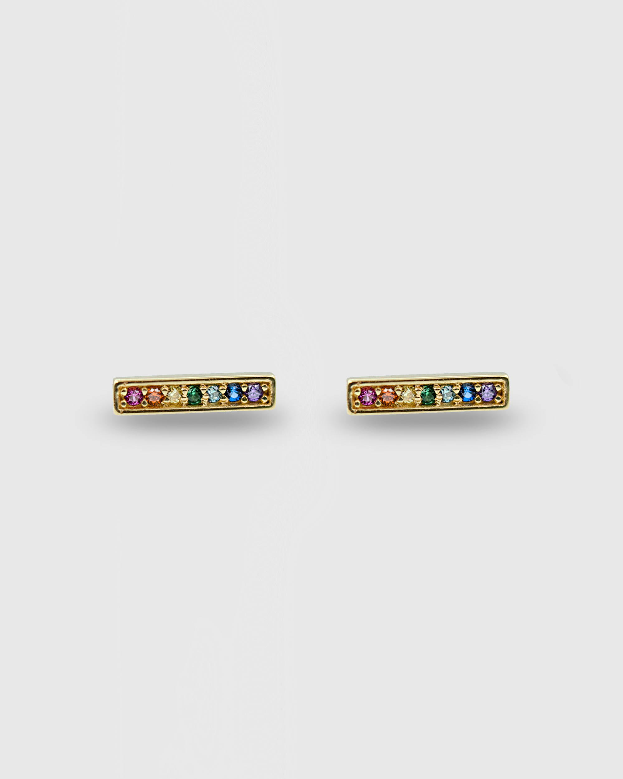 Piercing barra rectangular con circonitas arcoíris de oro sólido 14k