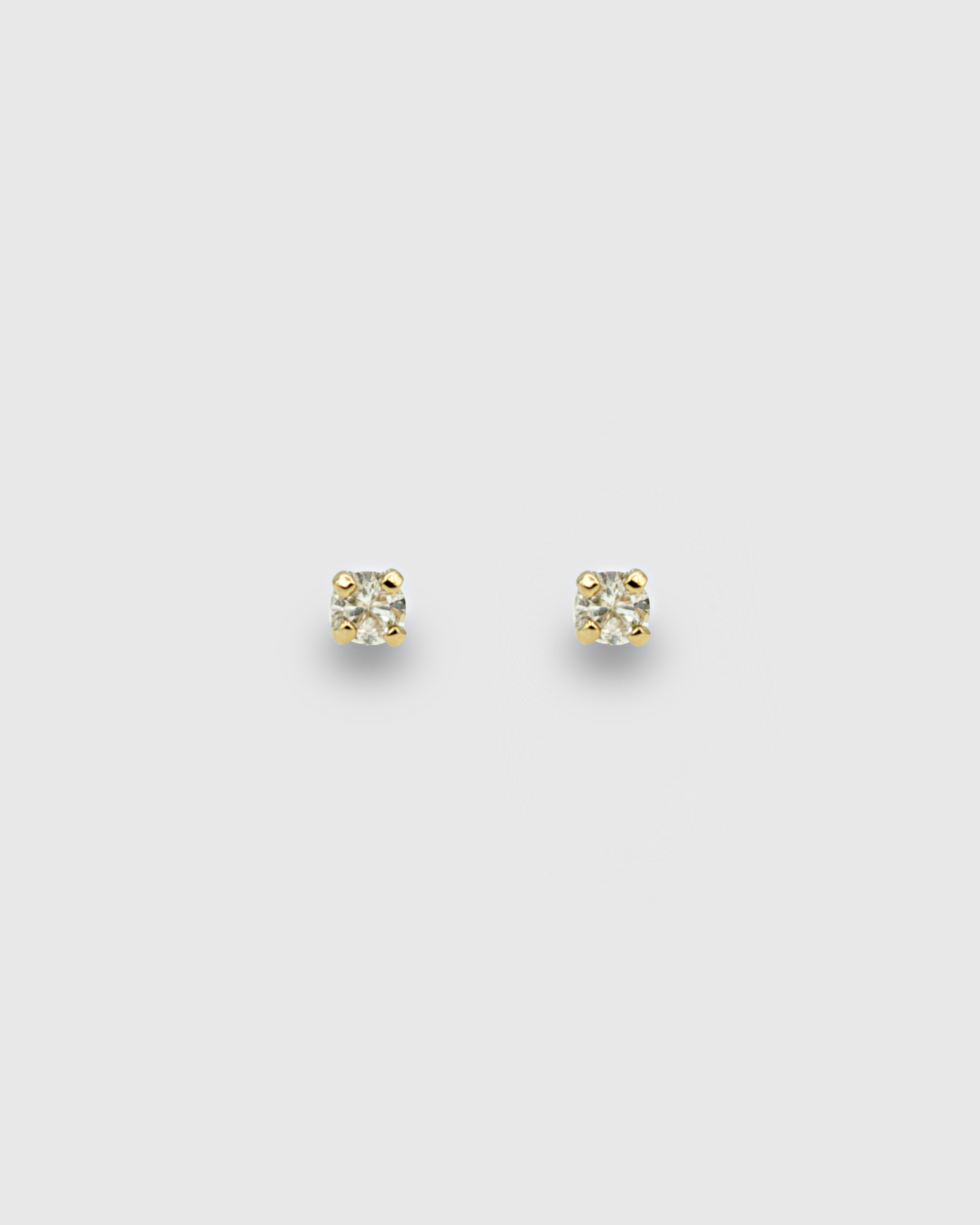 14k Solid gold with a genuine diamond