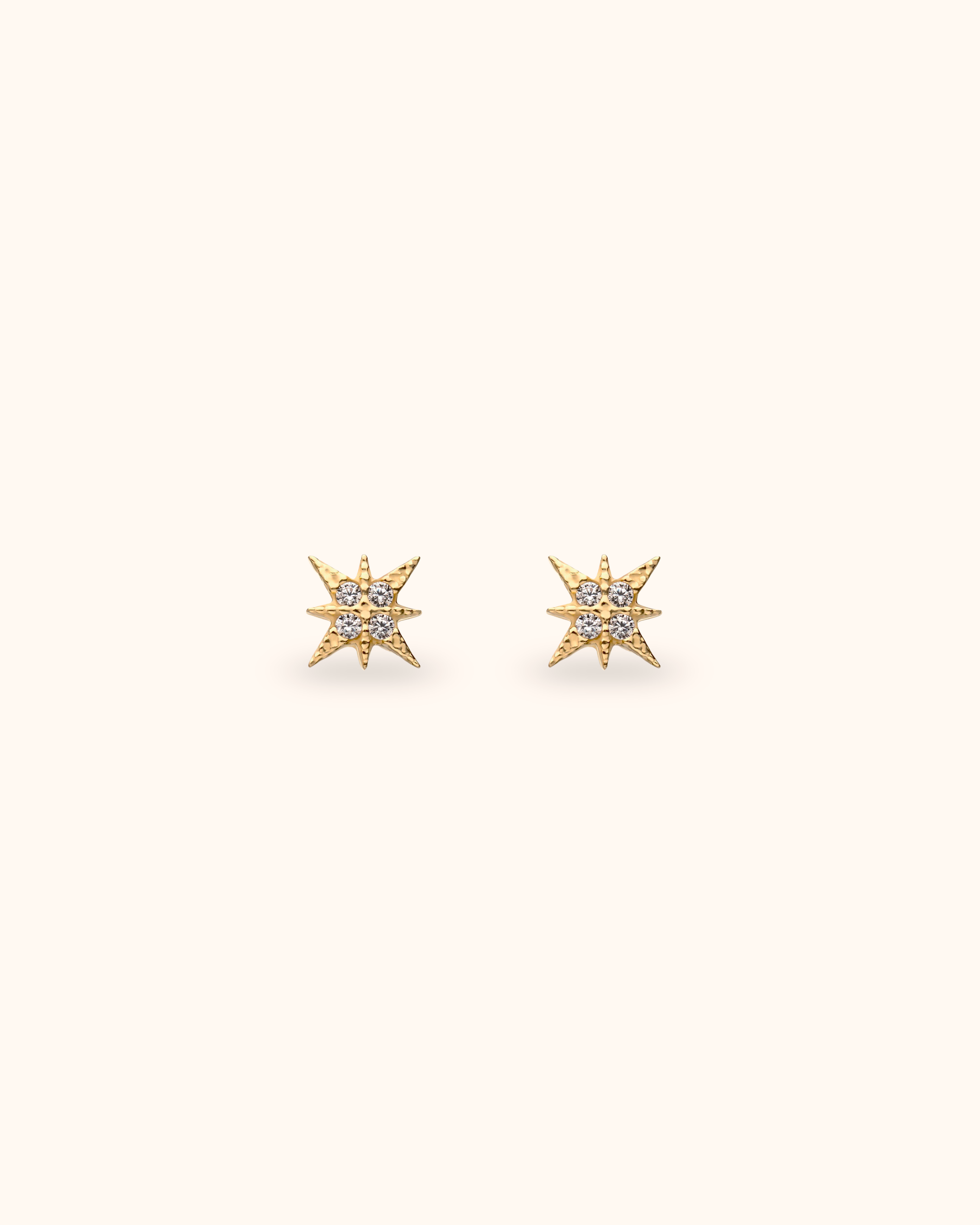 Piercing estrella de oro sólido 14k con circonitas
