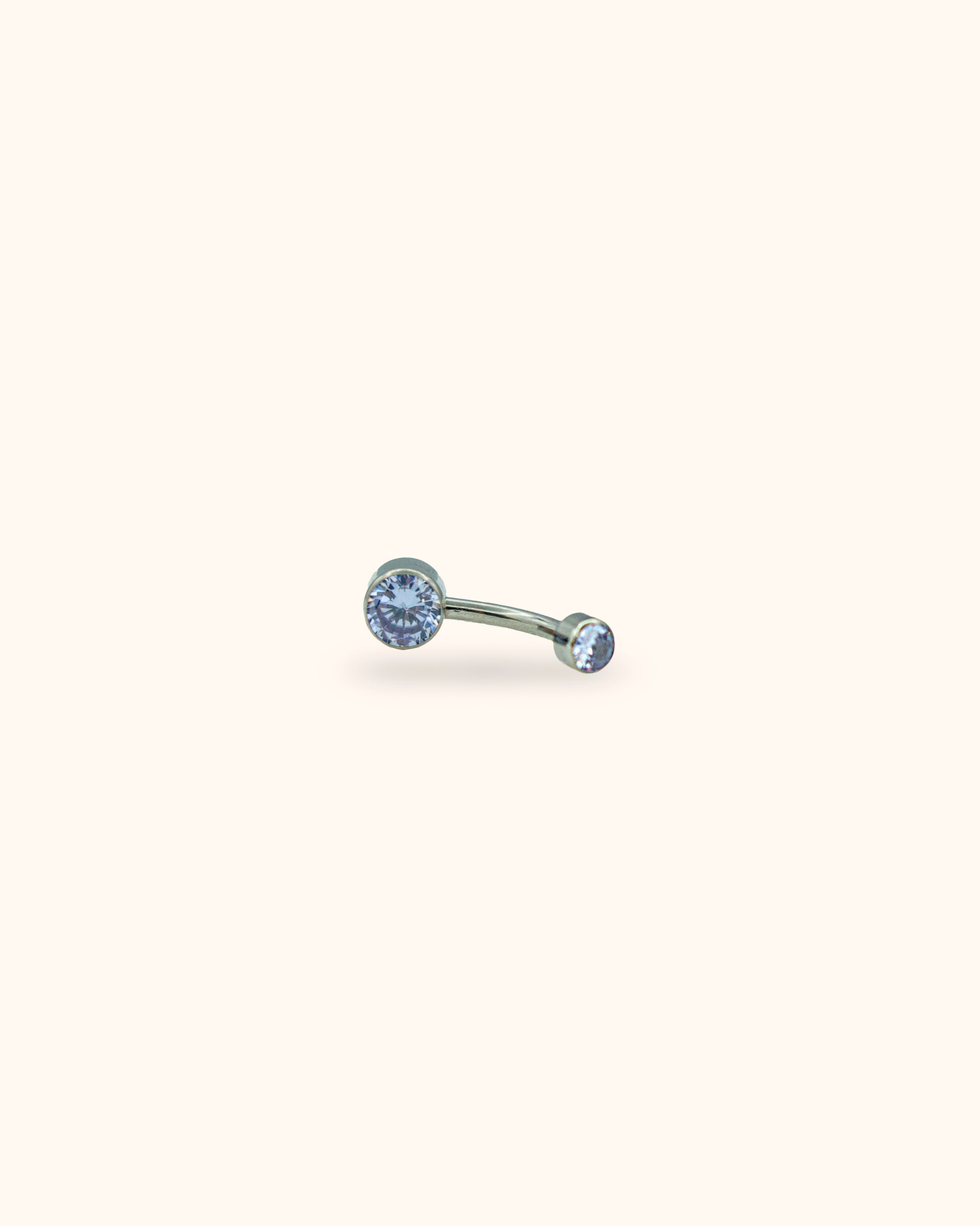 Piercing para ombligo de titanio con circonitas planas