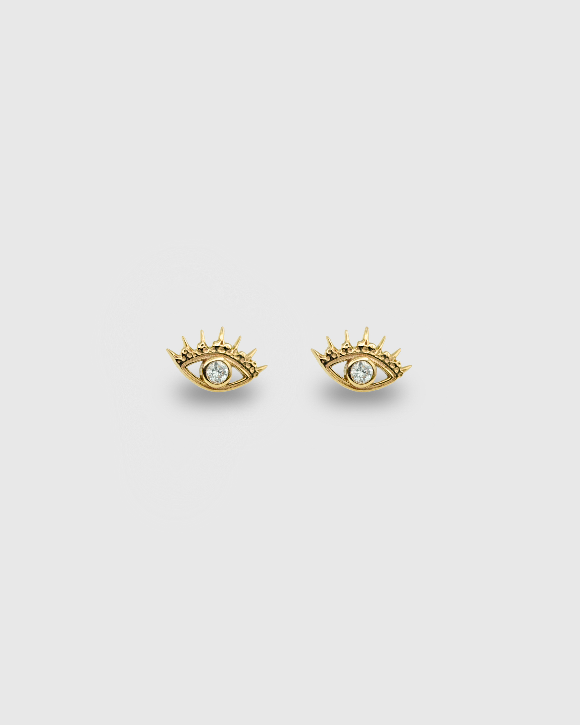 14k Solid gold evil eye with cz