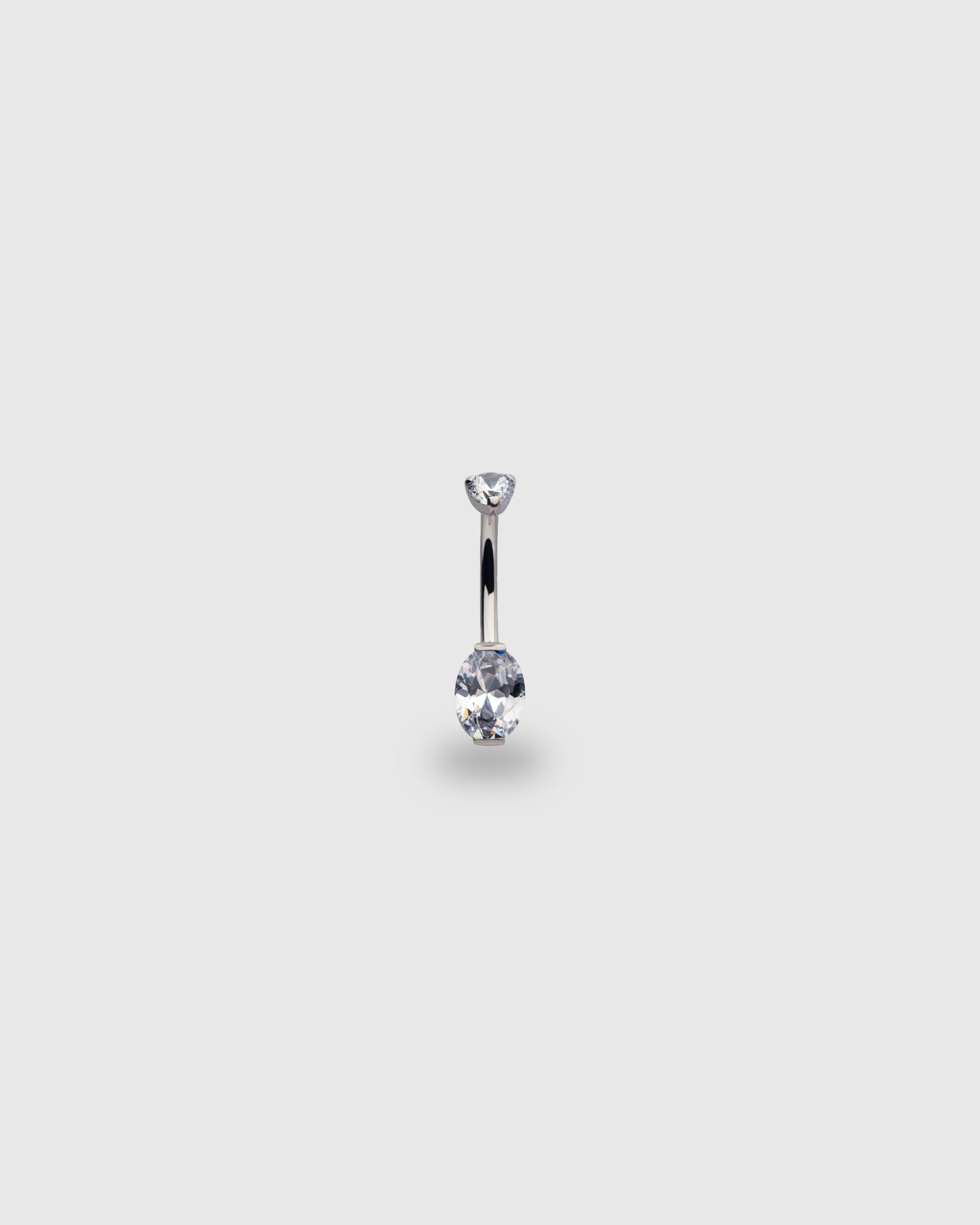 Piercing para ombligo navel de titanio con circonitas ovaladas