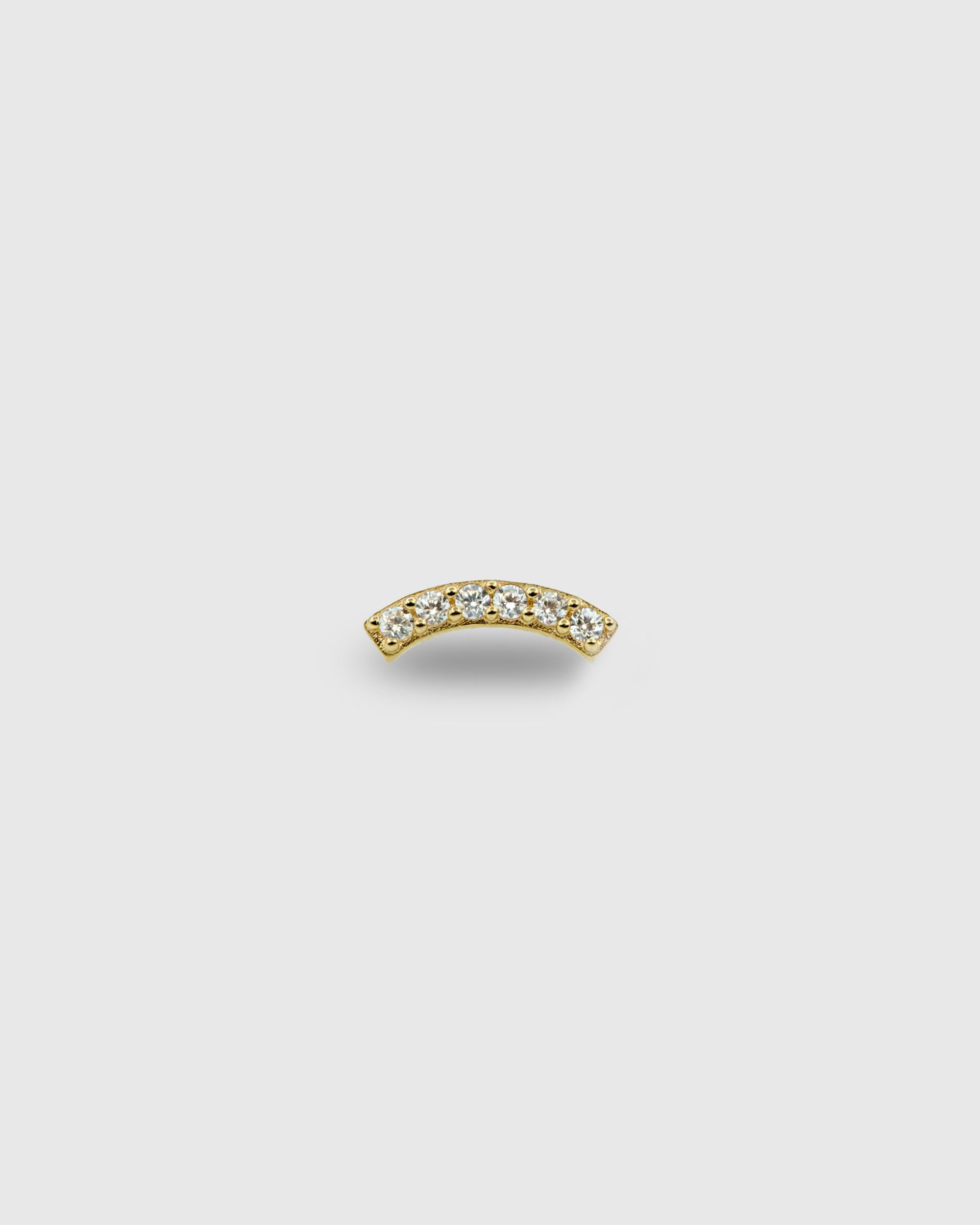 Piercing curvo de oro sólido de 14k con circonitas
