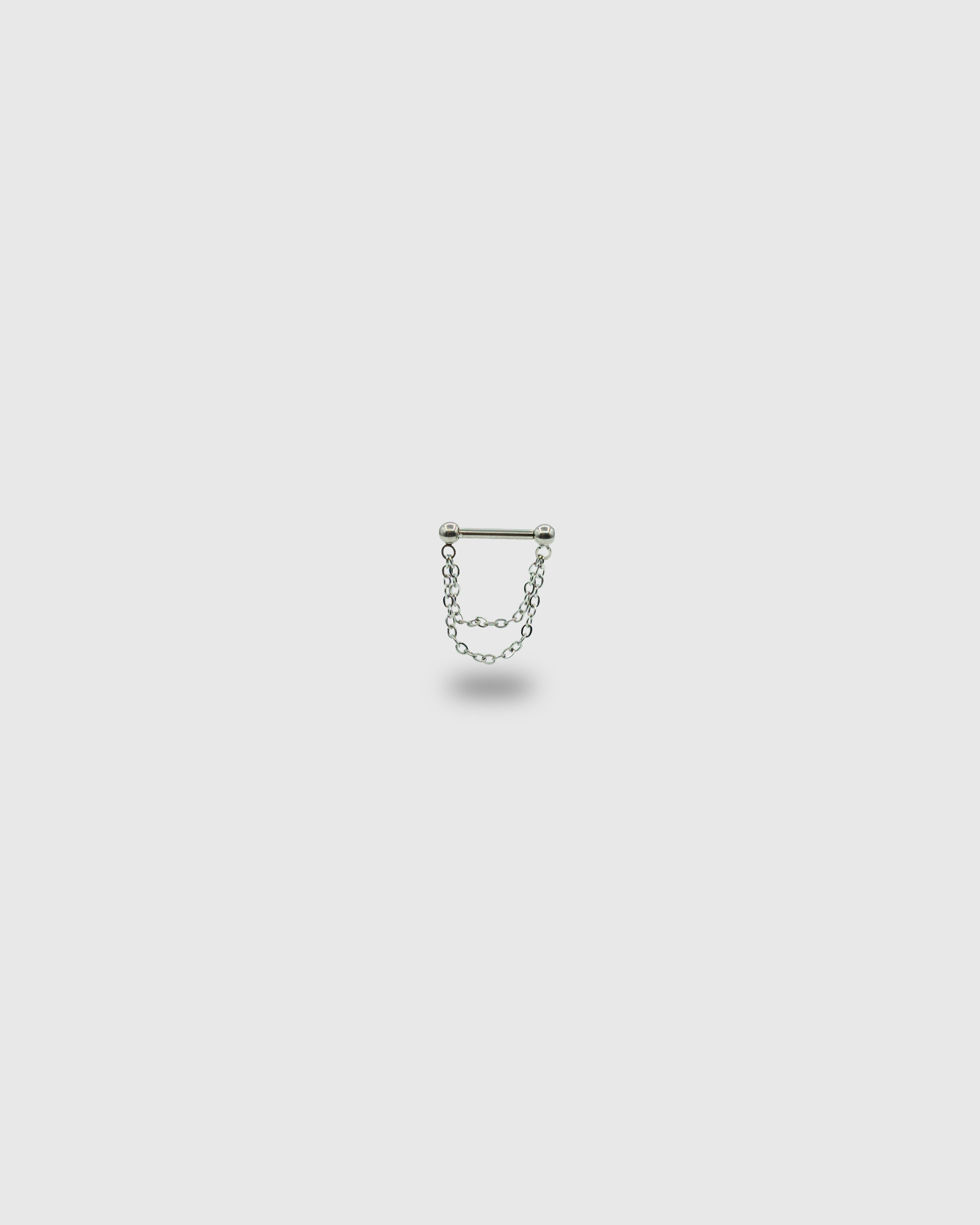 Barra de titanio con cadenas
