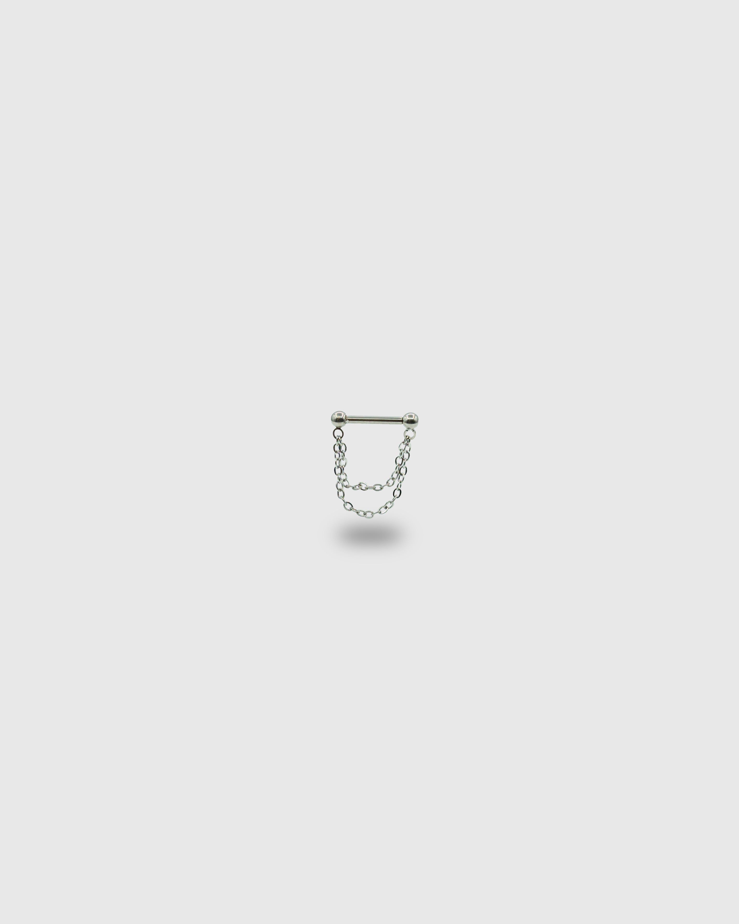 Piercing barra de titanio con cadenas