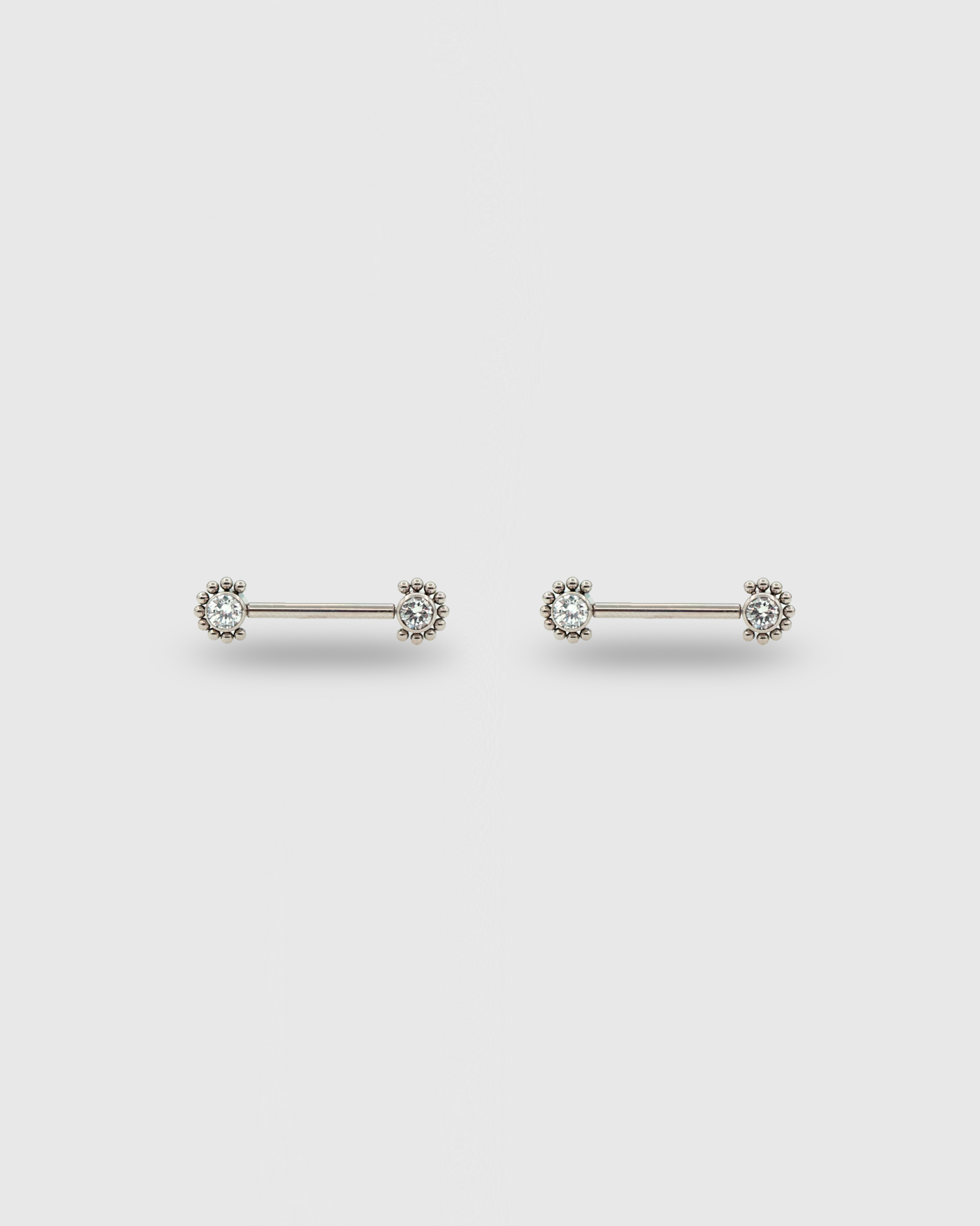 Piercing para pezón con circonitas y cuentas