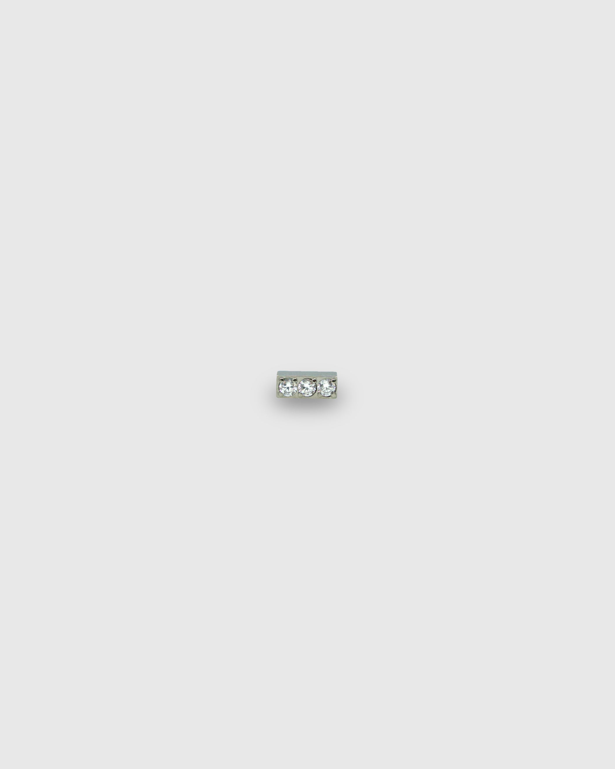 Piercing de titanio rectangular con circonitas