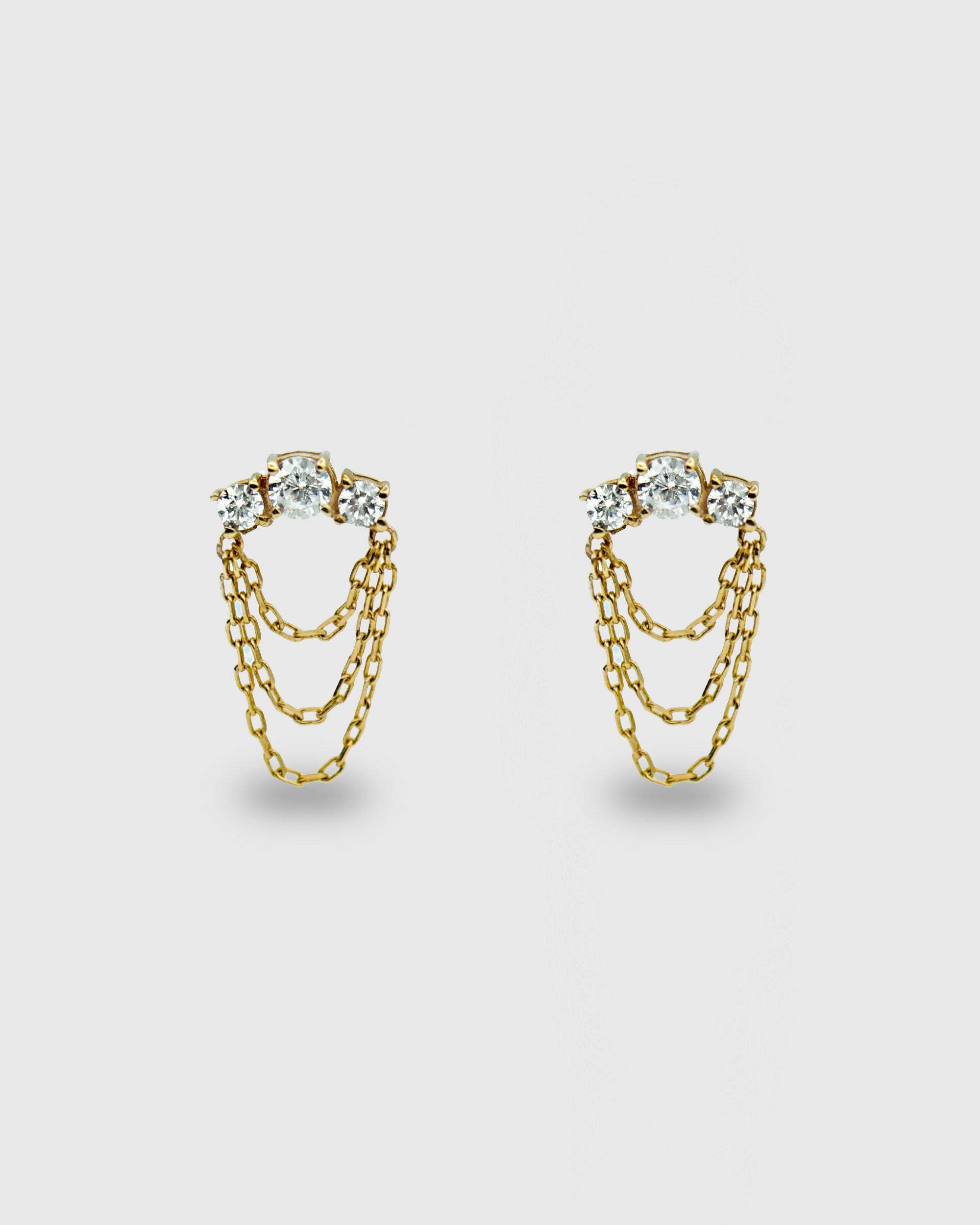 Piercing de oro sólido 14k de circonitas con cadenas