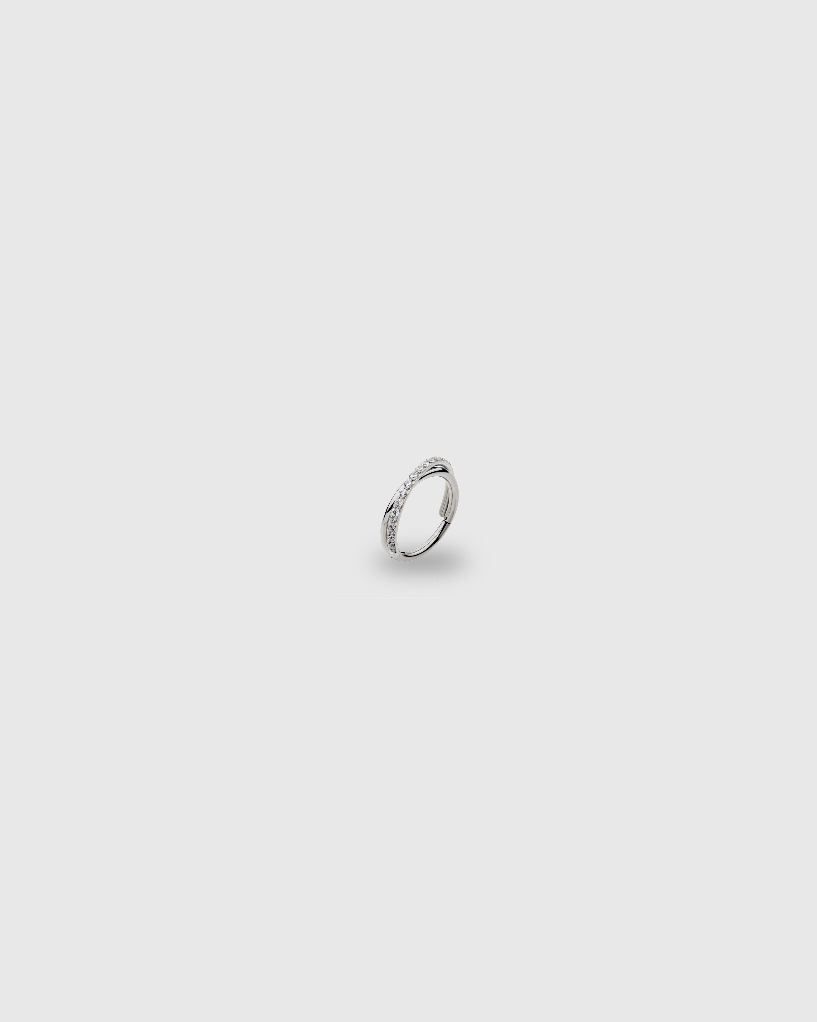 Titanium criss-cross ring with cz