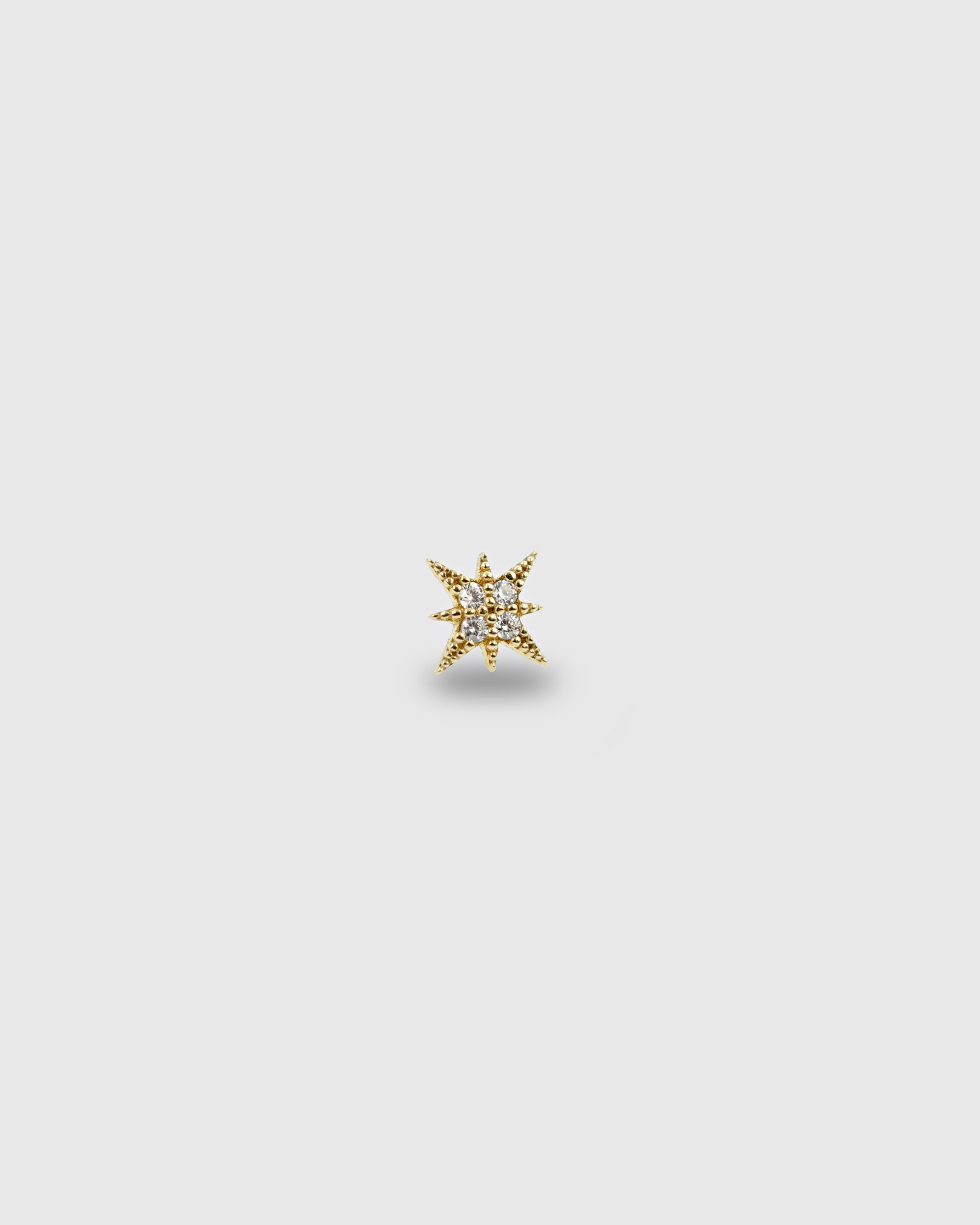 Piercing Estrella de oro sólido 14k con circonitas