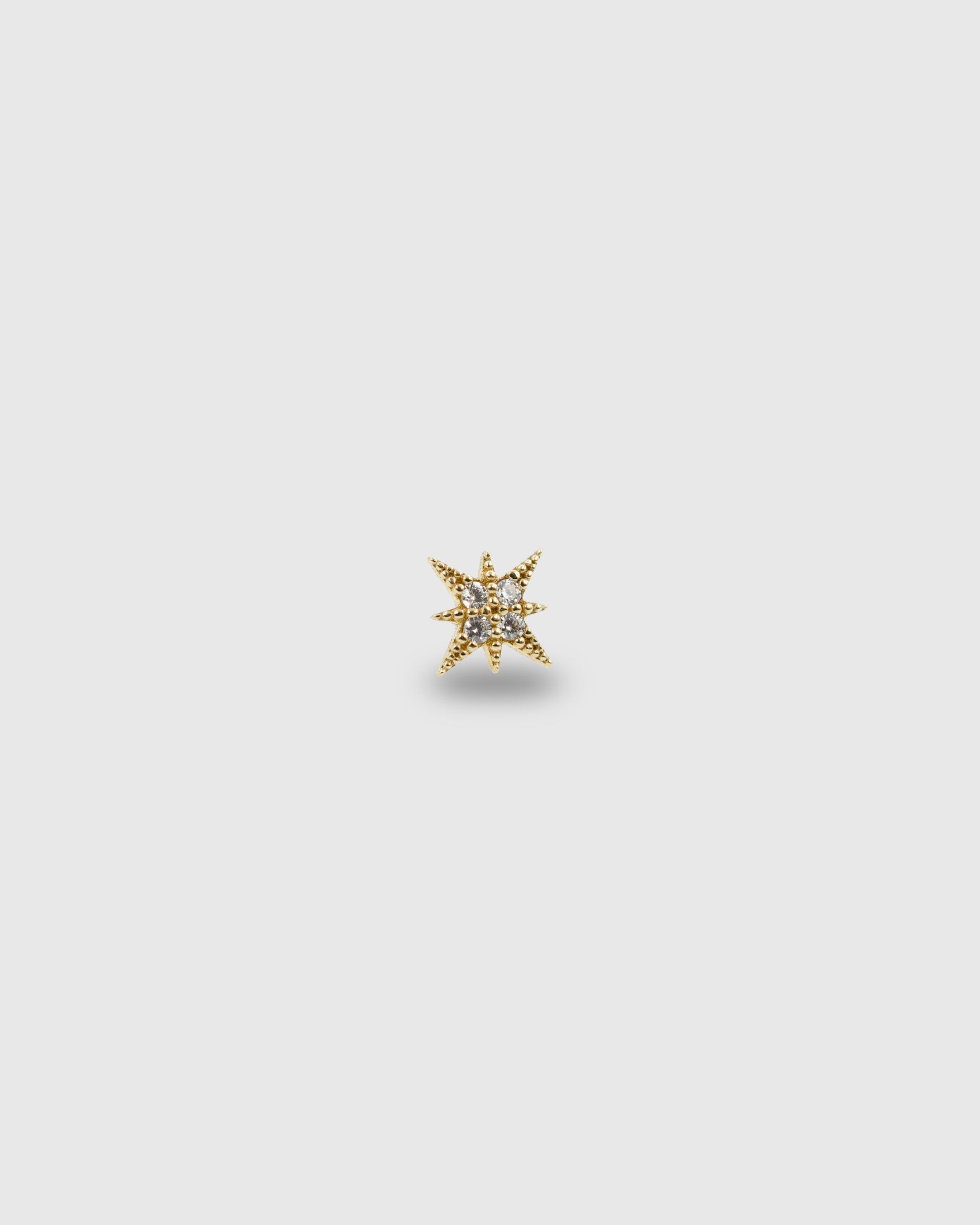 Pendiente Estrella de oro sólido 14k con circonitas