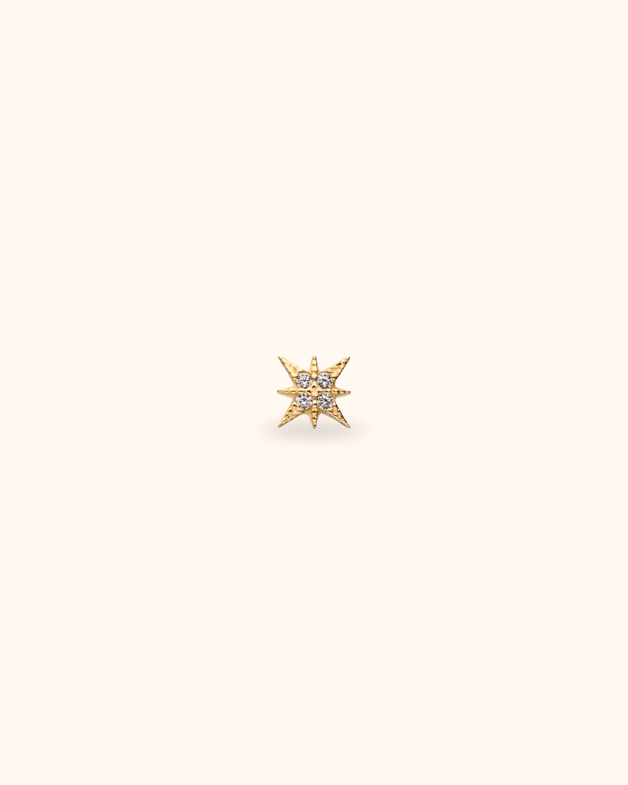 Piercing estrella de oro sólido 14k con circonitas