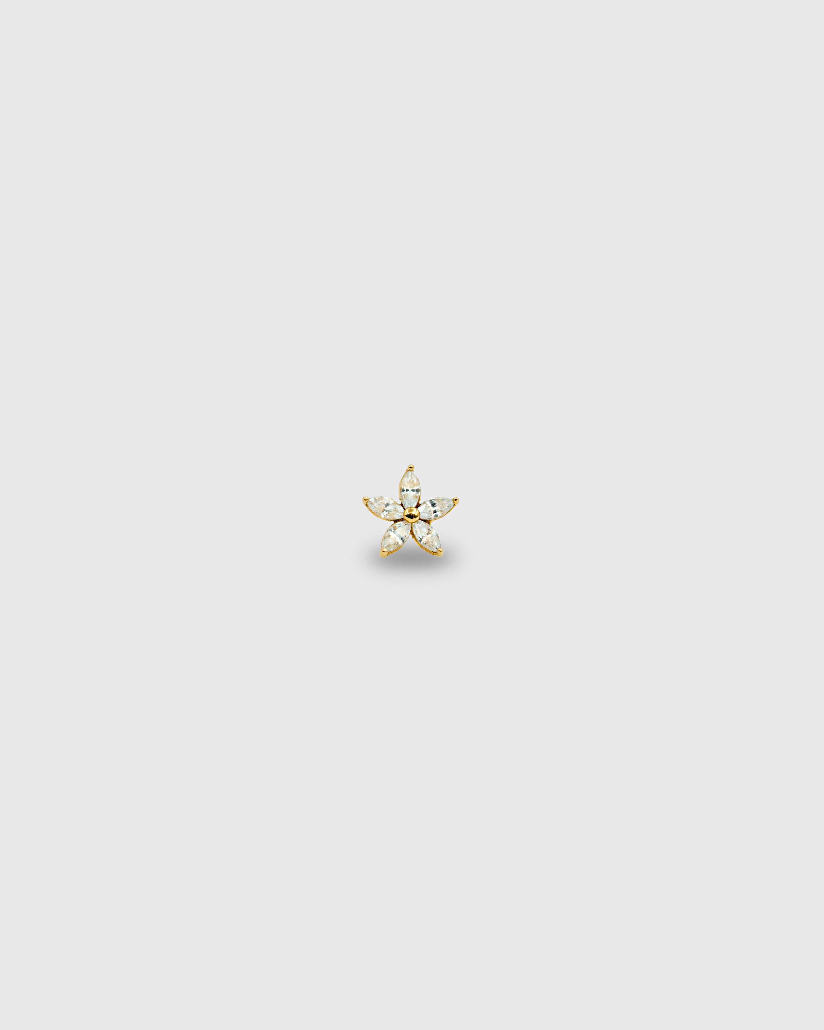 Piercing flor de oro sólido 14k y pétalos de circonitas