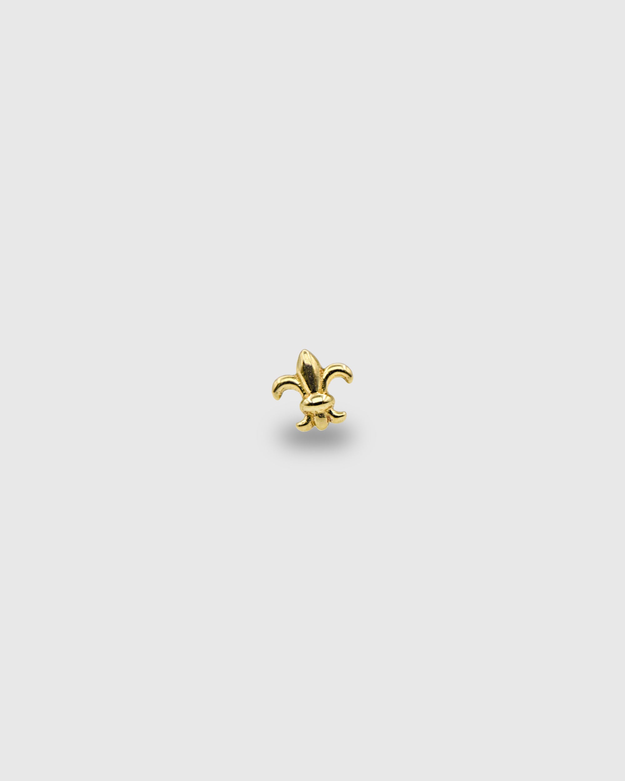 Piercing Flor de Lis de oro sólido de 14k