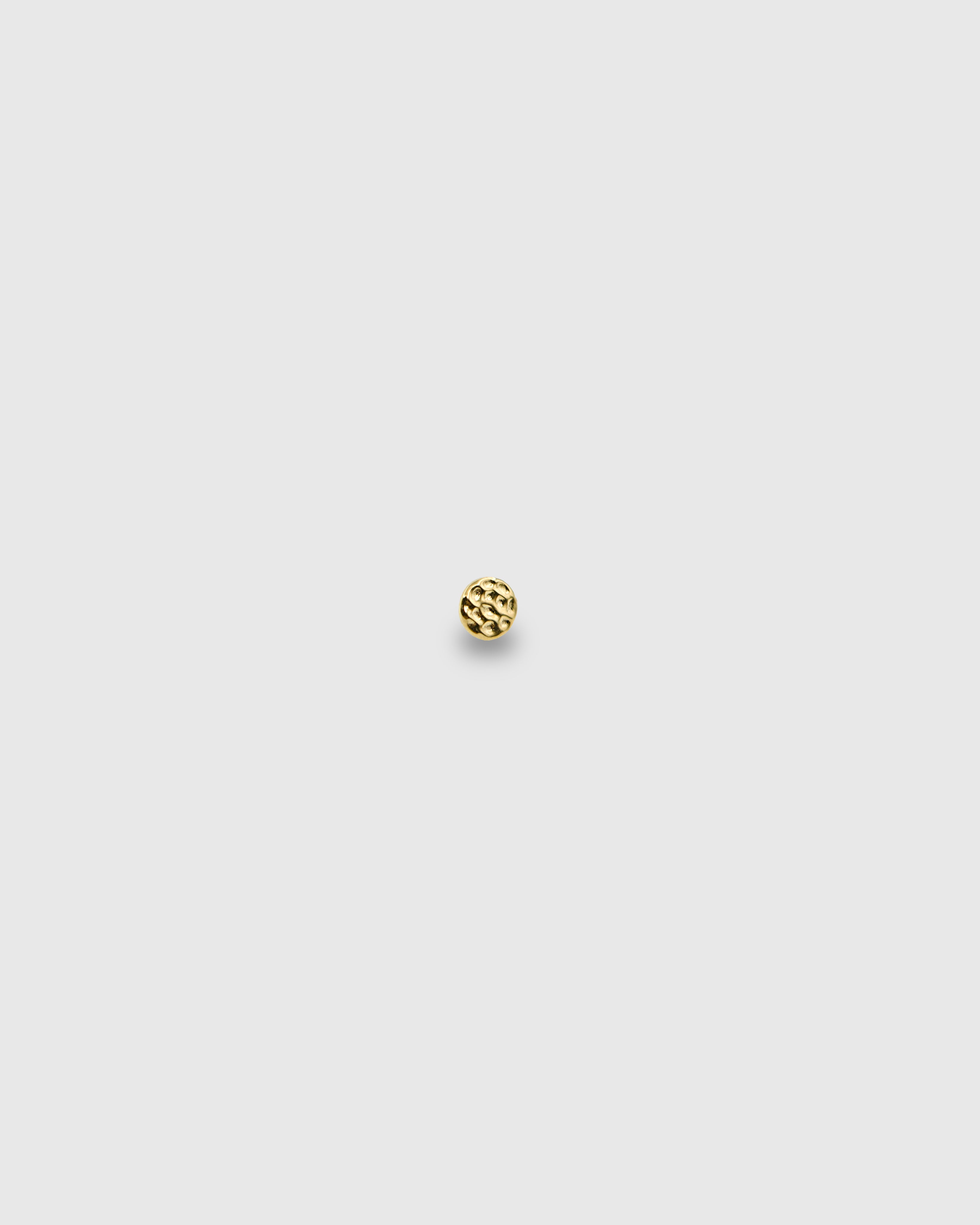 Piercing redondo martillado oro 24k PVD