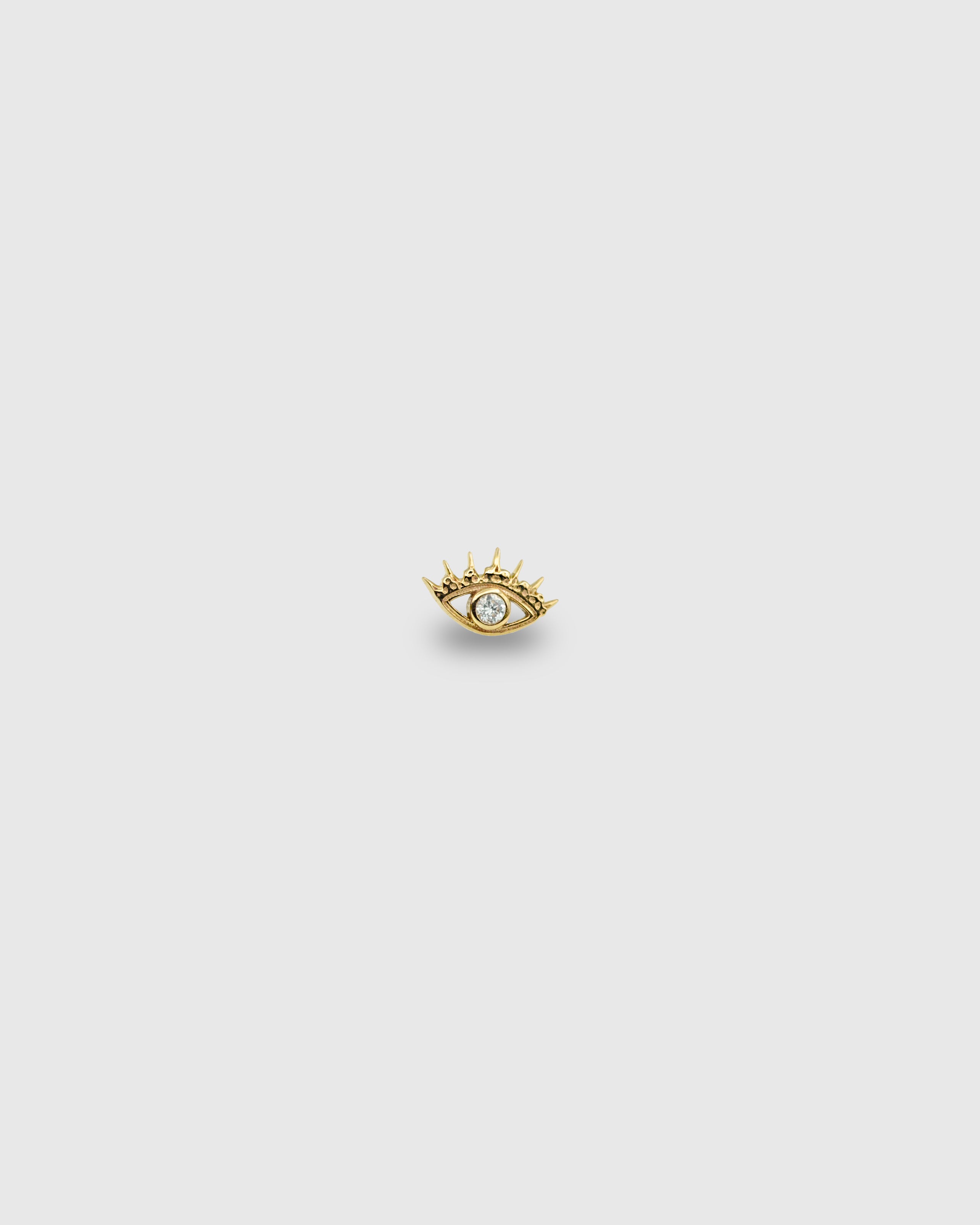 Pendiente Ojo de oro sólido 14k con circonita